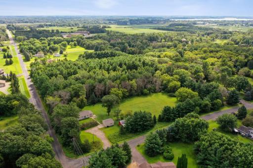 Scenic neighborhood with rolling green hills and private wooded lots, offering a balance of seclusion and community.