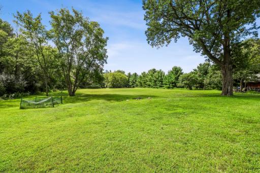 Over an acre of open green space, perfect for gardening, entertaining, or future expansions.