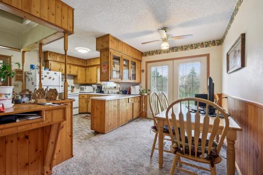 Open layout between the kitchen and dining area, perfect for everyday meals and entertaining guests.
