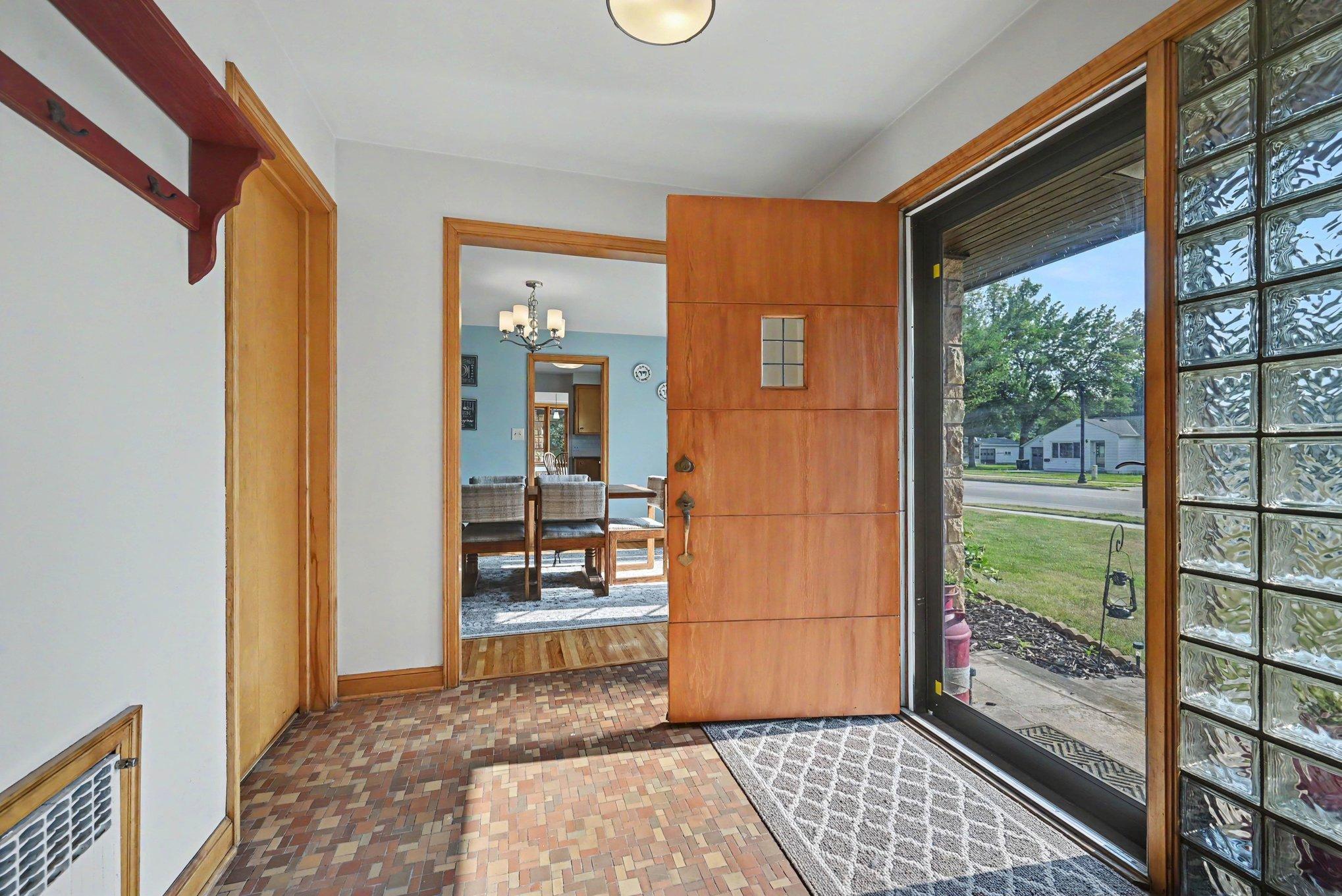 Front entry with glass block detail and tile floor, 1950 Montgomery MN home.