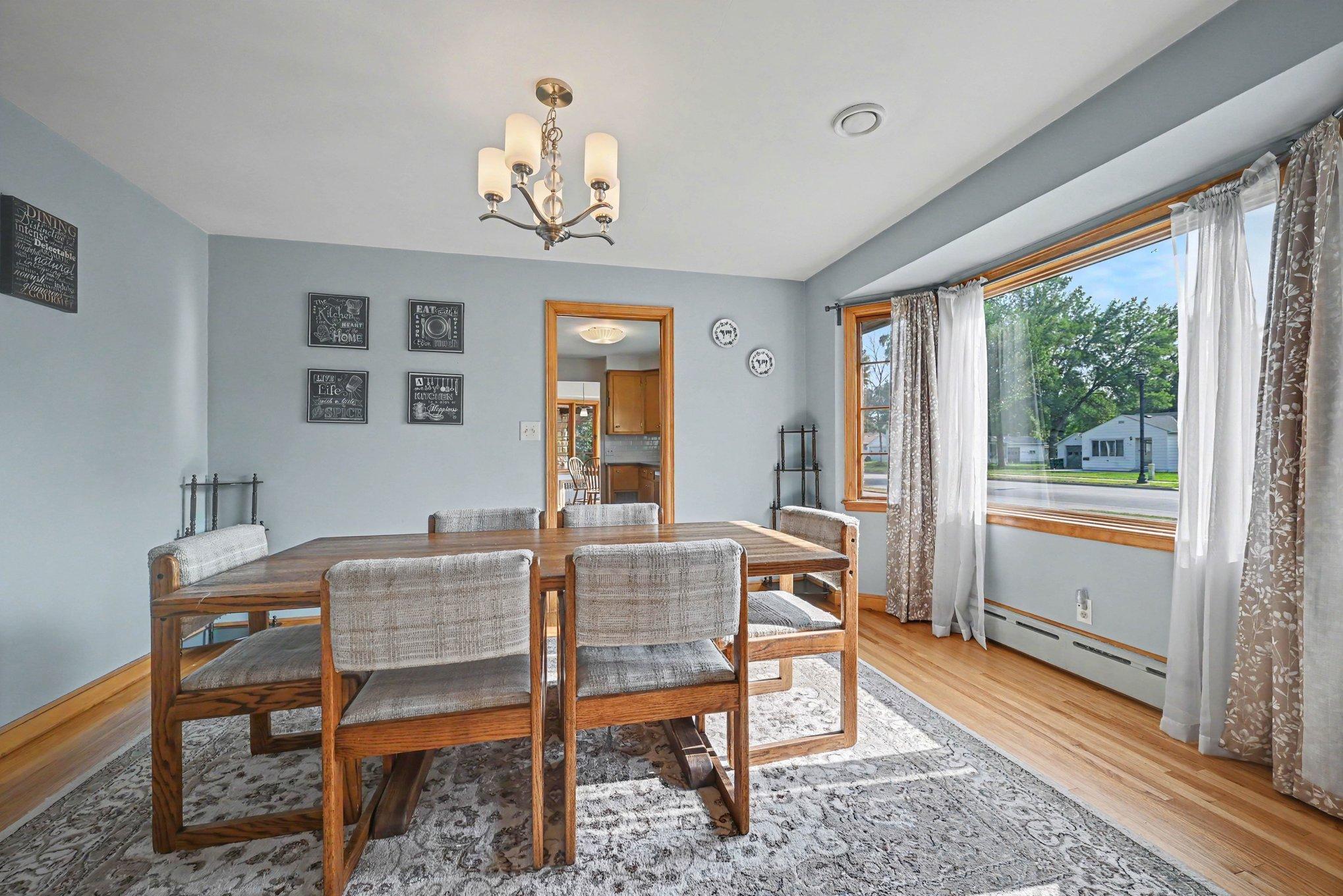 Formal dining room with hardwood floors and natural light, 300 5th Street NE Montgomery MN.