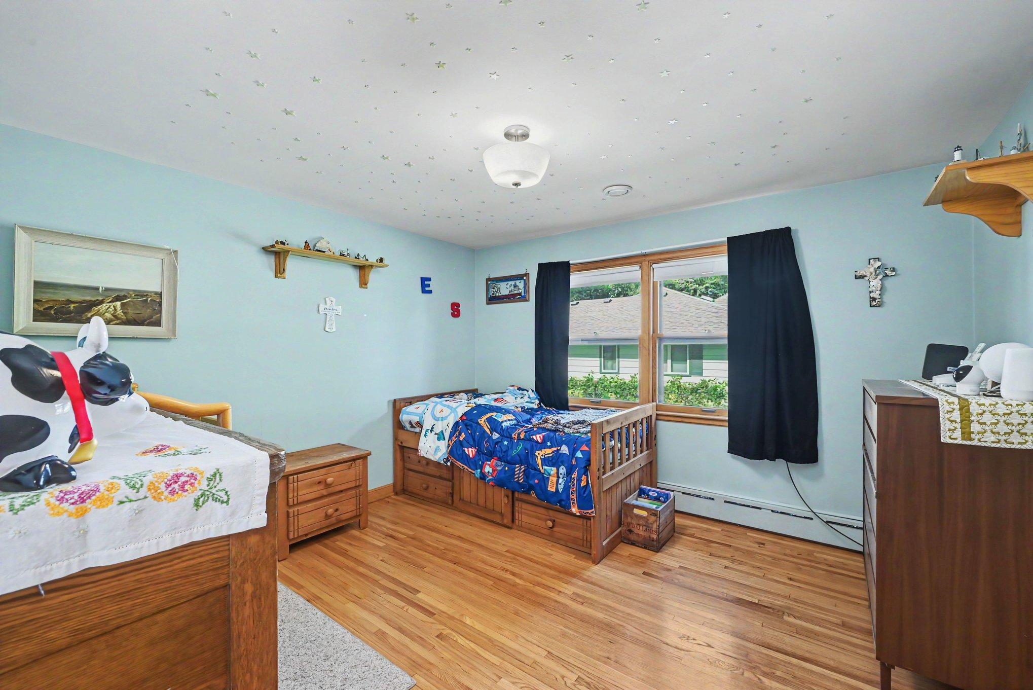 Second main floor bedroom with hardwood floors, Montgomery MN home for sale.