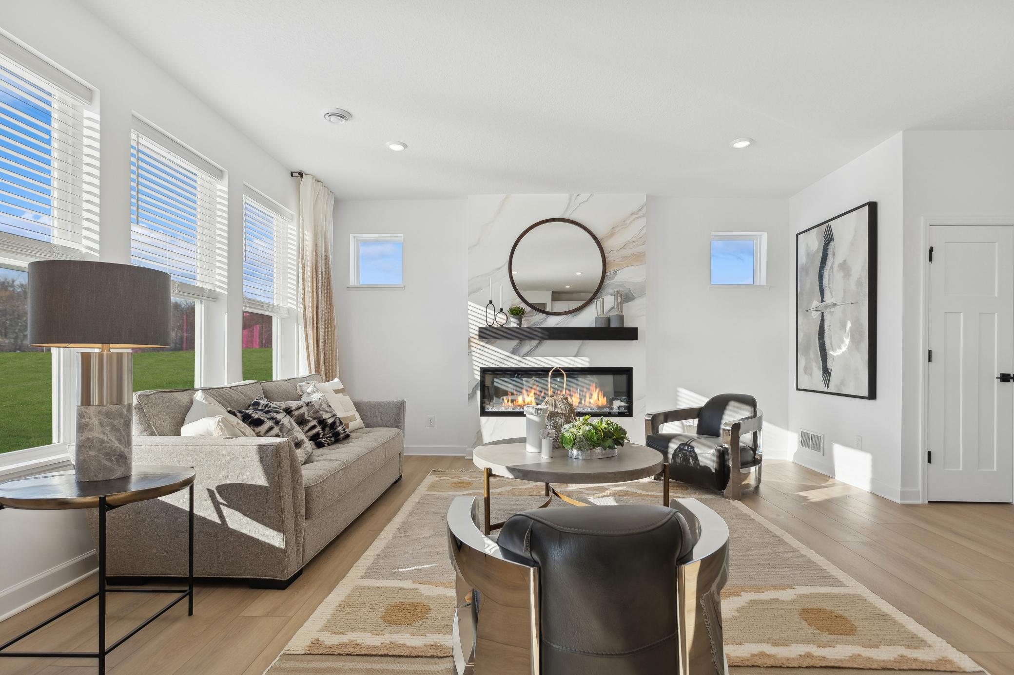 (Photo of a decorated model, actual homes finishes will vary) Notice the natural flow of light in this well-designed floor plan.