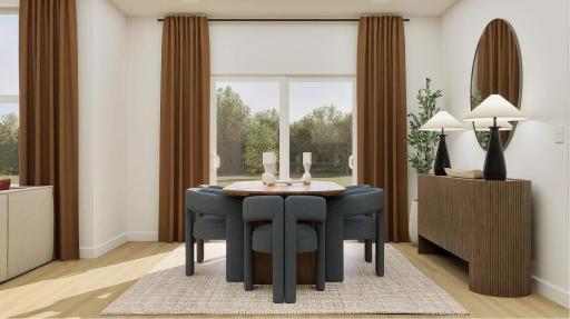 (Rendering, actual home's finishes will vary.) Sliding glass doors invite plenty of natural light into the space and lead directly to the backyard
