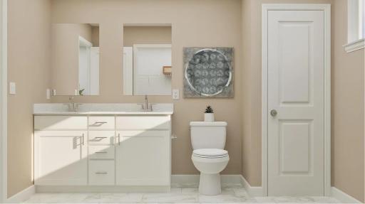 (Rendering, actual home's finishes will vary.) Easily balance shared routines at the elegant dual-sink vanity topped with twin plate glass mirrors