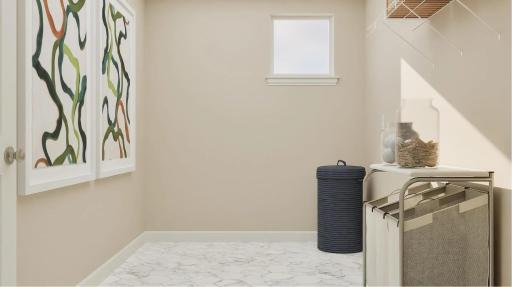 (Rendering, actual home's finishes will vary.) This large laundry room provides a location in the home to get household chores finished and keep messes out of sight.