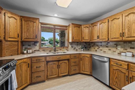 Stylish tiled backsplash compliments updated countertops!