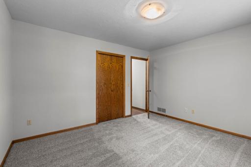 Bedroom #2. Fresh paint and new carpeting!