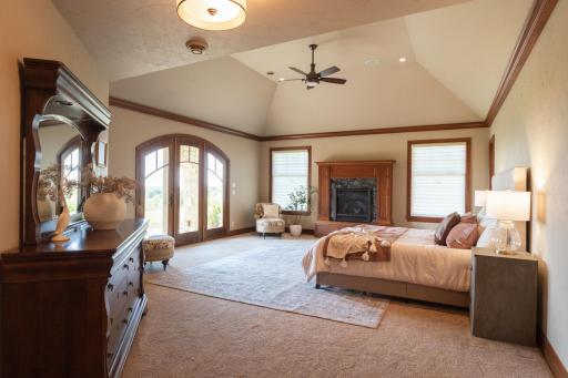 Main floor primary suite with gas fireplace.