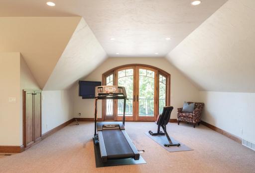 Exercise area overlooks the wide-open fields and woods.