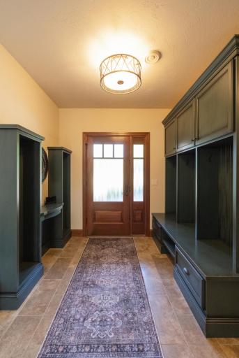 Back entry with places for all your coats, boots and shoes.