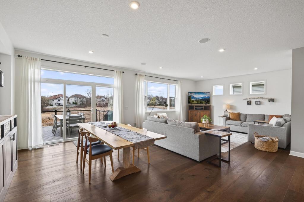 Large dining area open to the living room and kitchen