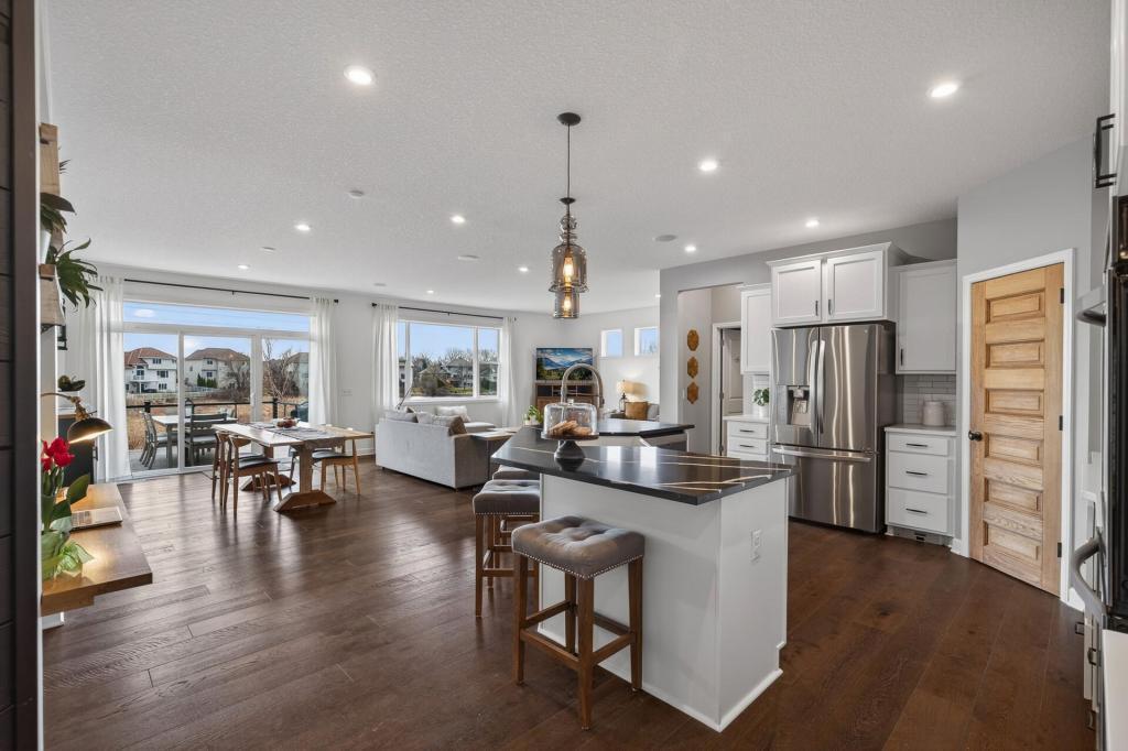 Kitchen open to living and dining areas.