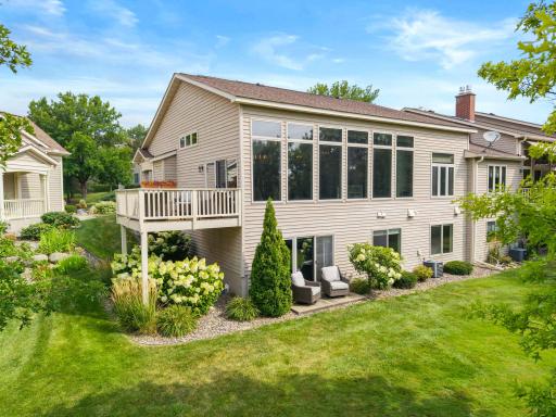 Summit Shores, end-unit townhome offering an incredible wall of windows that bring in a ton of natural light and offer serene Earley lake views! Don't miss this one!