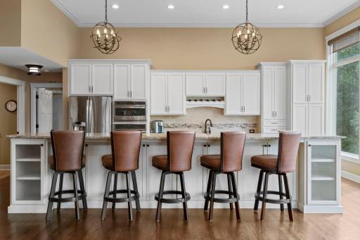 Oversized breakfast bar is perfect for entertaining or casual meals at home.
