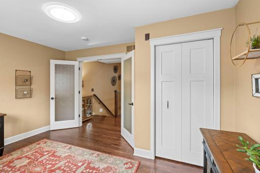 French doors to main level office! Elegant white woodwork and wide trim throughout.