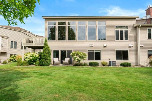 Walkout lower level is perfect to jump on 1.3 mile trail loop around Earley Lake.