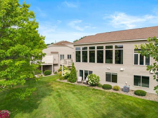 Hard to find setting overlooking lake, walking trails, nearby shopping, restaurants and more!