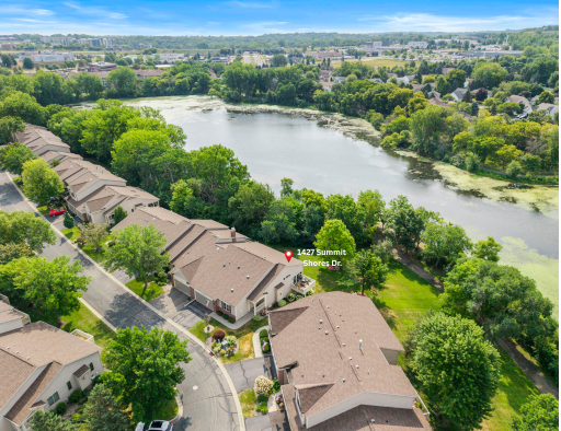 This is a must-see end unit, Rambler style townhome located in sought-after Summit Shores of Burnsville. Incredible lot offering a perfect setting with striking lake views and mature trees. One-level living with a view!