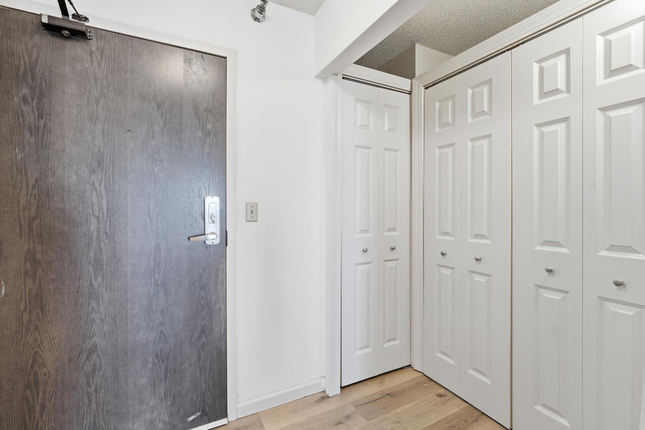 Entry closets 2807 The Pointe Condominiums St Paul, MN.jpg