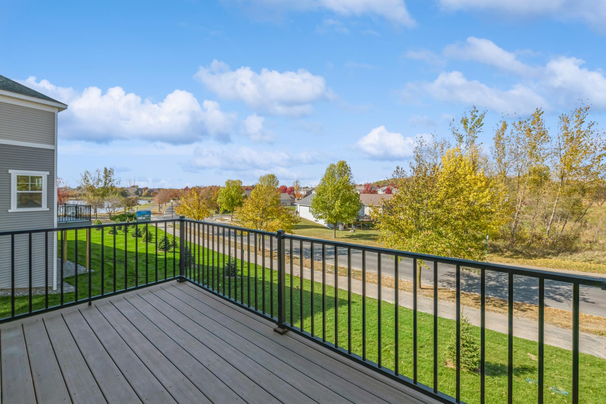 (Photo of an inventory home, actual homes finishes will vary) Stunning views from your new MAINTENANCE FREE deck!