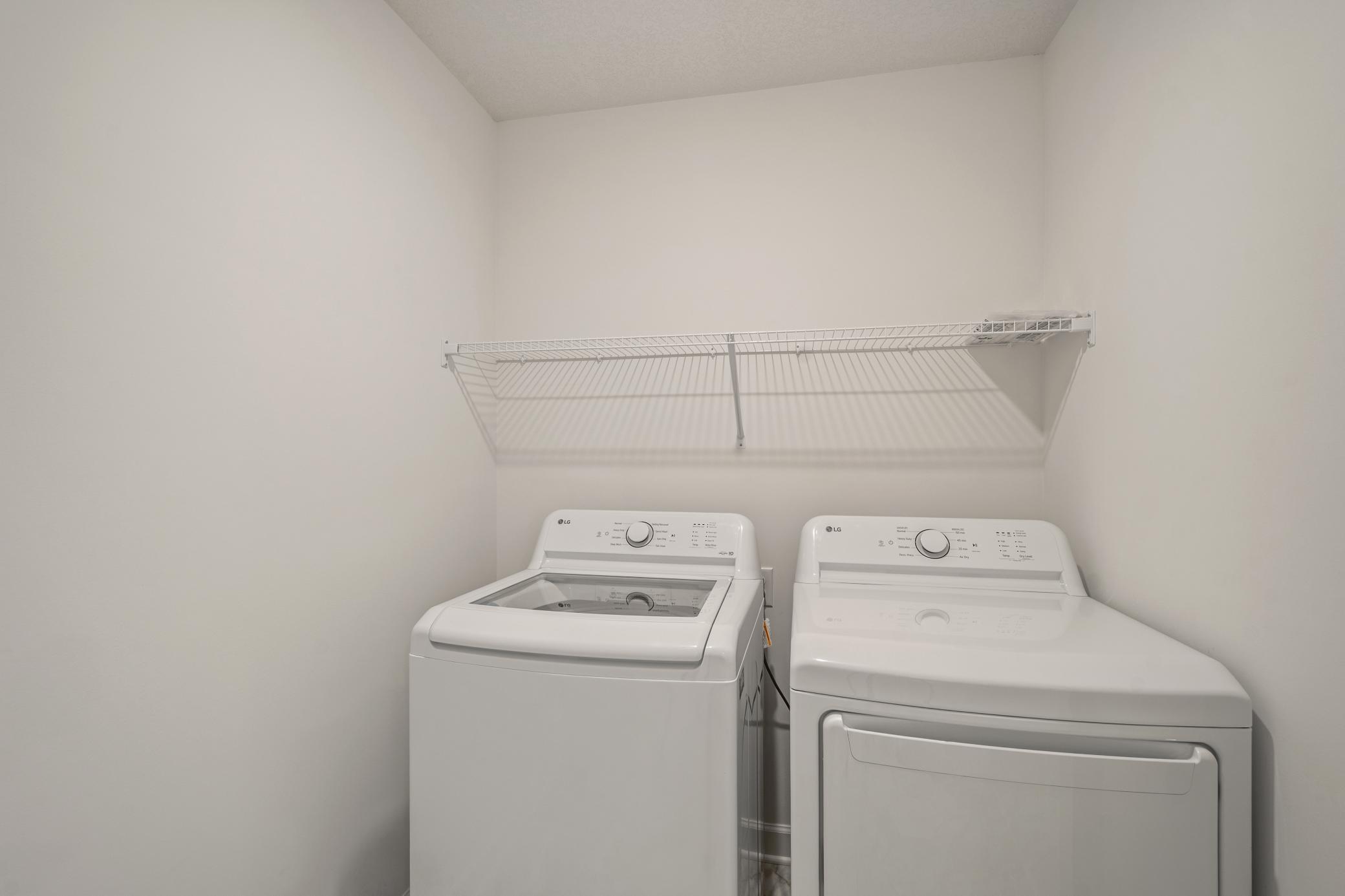 (Photo of an inventory home, actual homes finishes will vary) Conveniently located upper level laundry room.