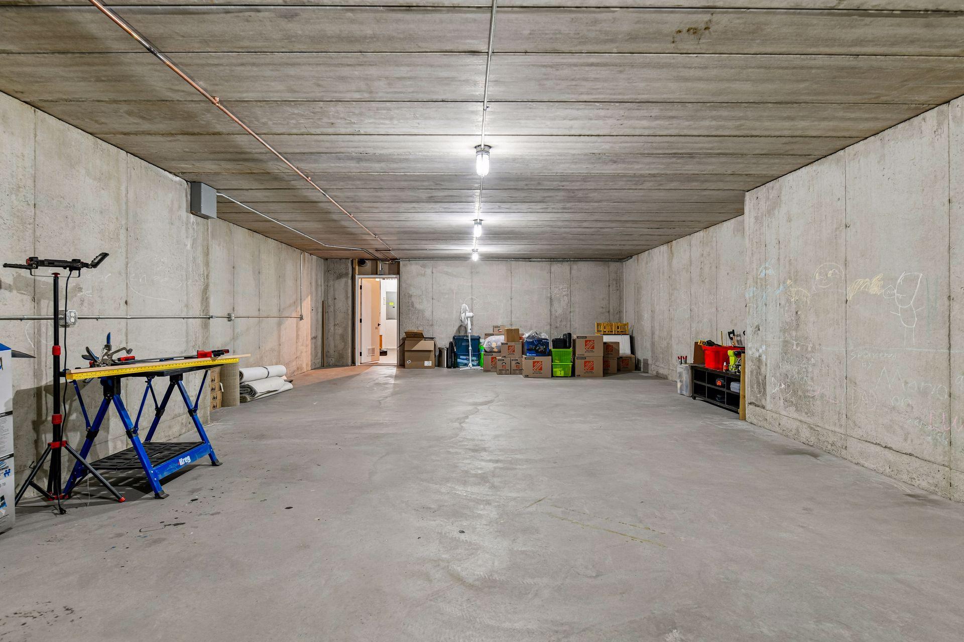 Unfinished space below the 4 car garage.