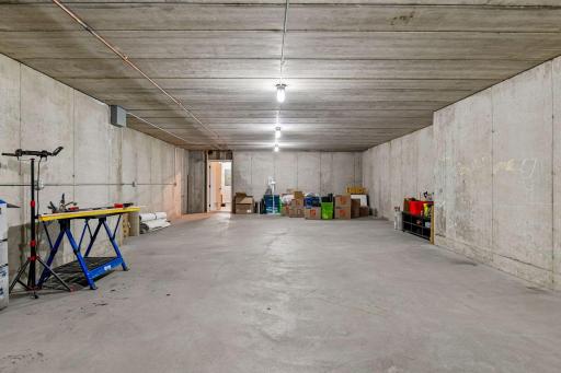 Unfinished space below the 4 car garage.