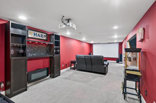 Family room is equipped with a home theater setup.jpg