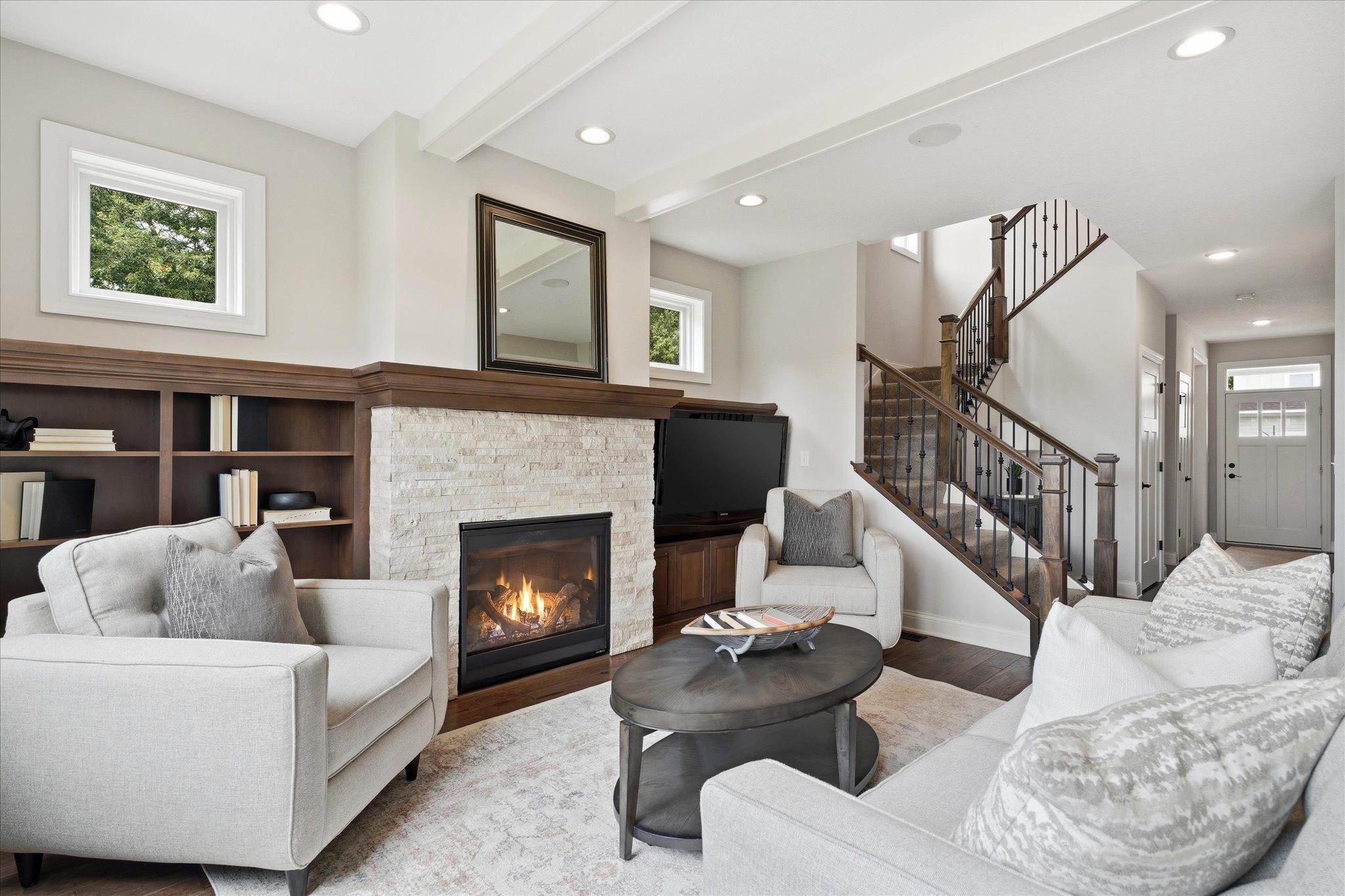 Open-concept great room seamlessly connects to the foyer and upper level.