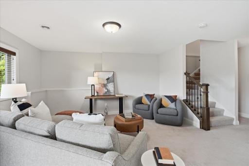 Bright and inviting family room provides generous gathering space.
