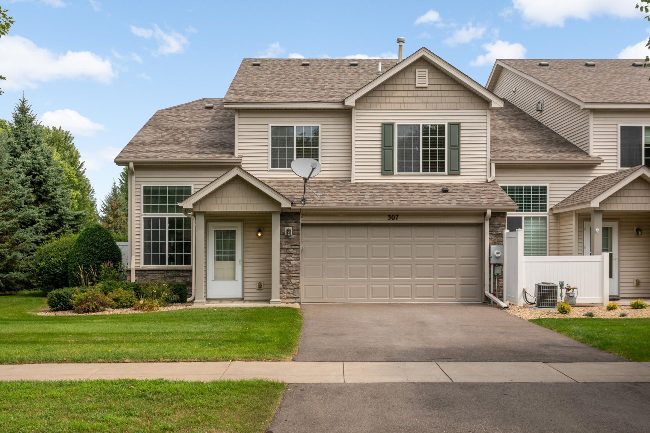 End unit with lots of green space outside
