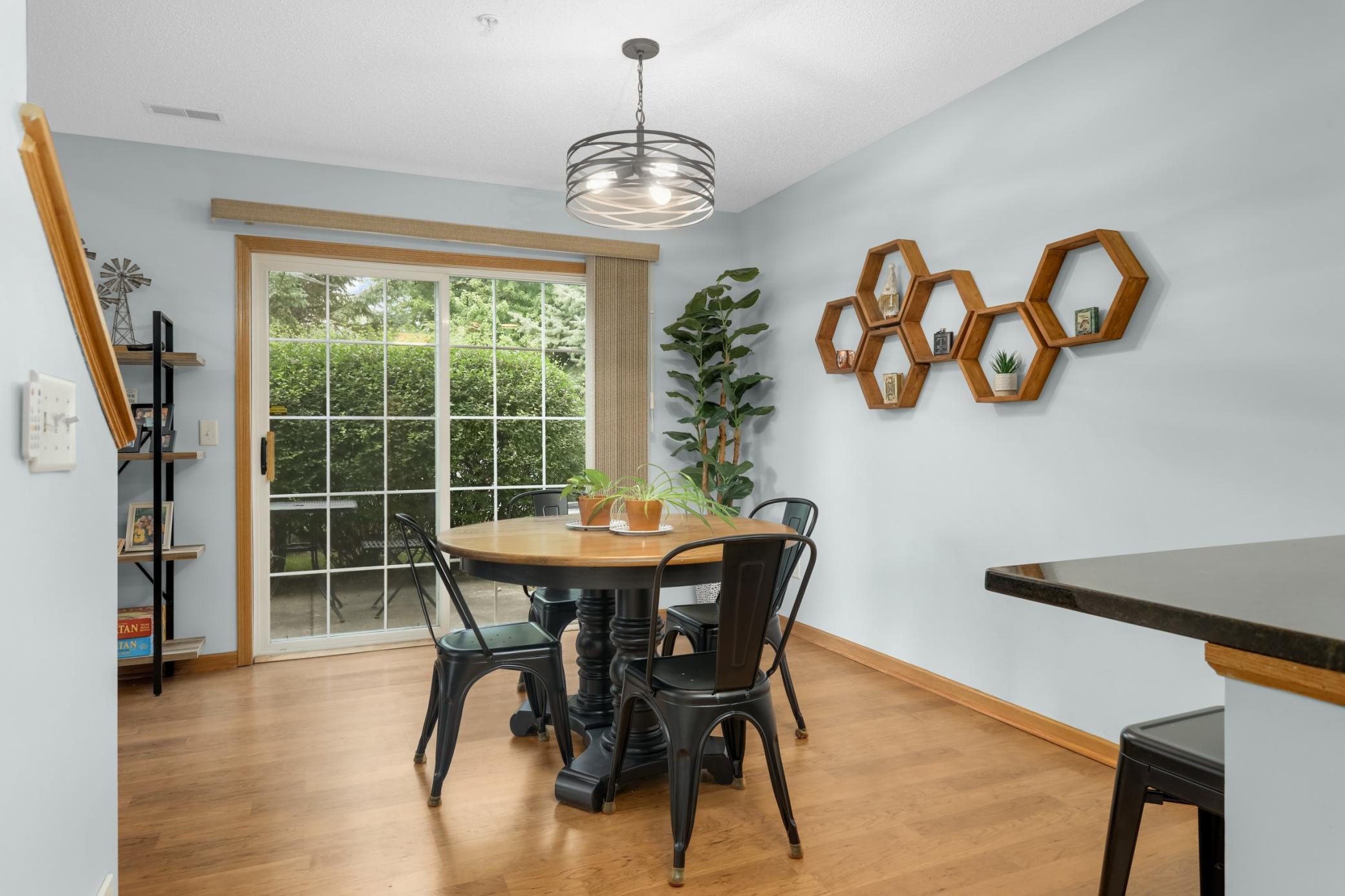 Dining space opens up to private patio