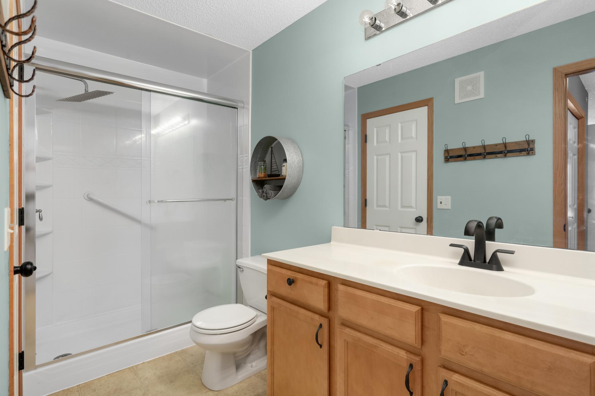 Upper level bathroom is connected to the primary