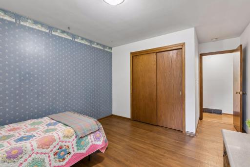 Bedroom 3 - large closet, hardwood floors.