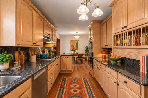 VIRTUALLY STAGED Kitchen tons of cupboards and counter space .png