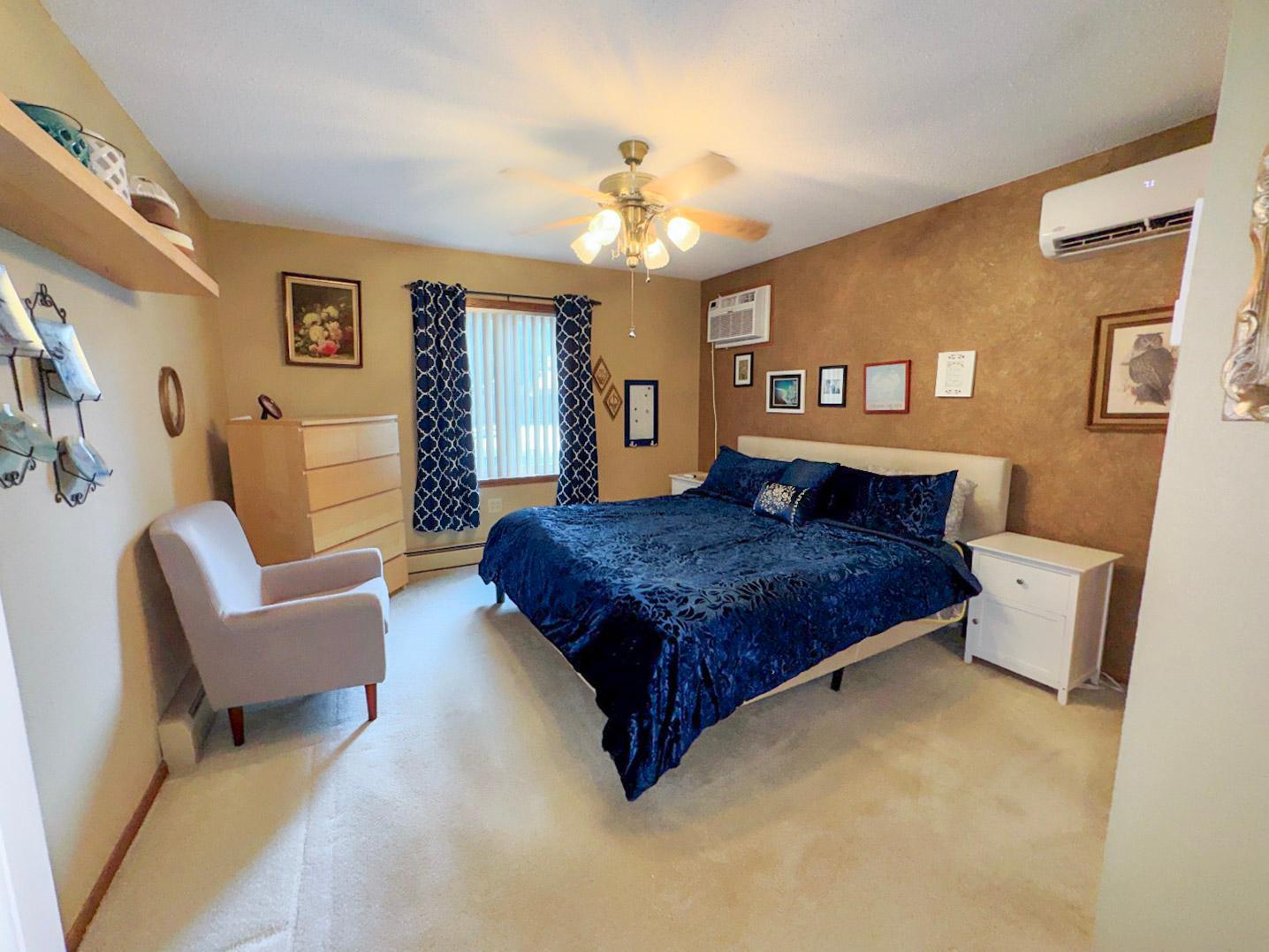 Primary Main Floor Bedroom with a walk in closet and 1/2 bath just off of this.