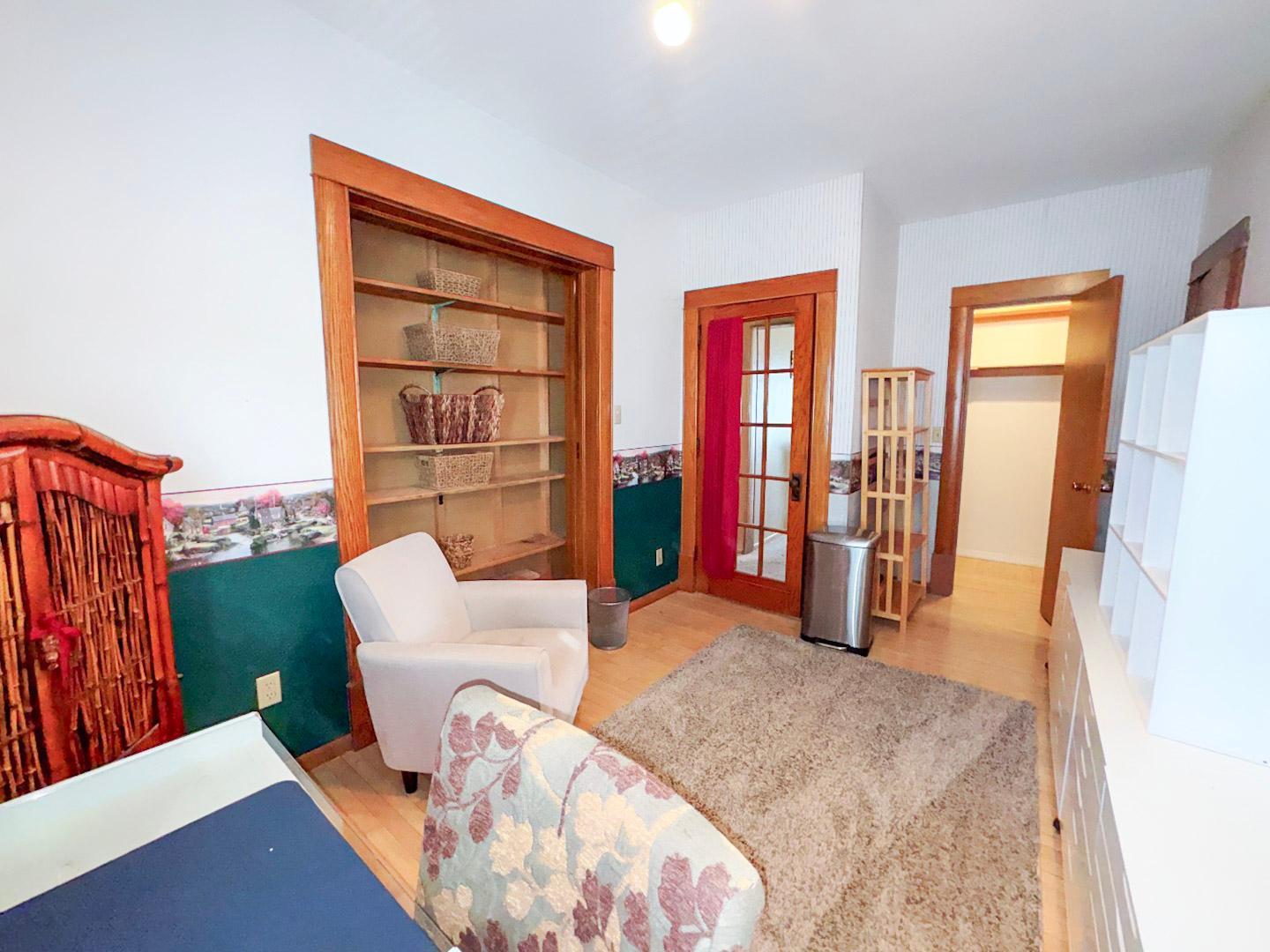 Bedroom #3 Main Floor with 2 closets and beautiful natural woodwork