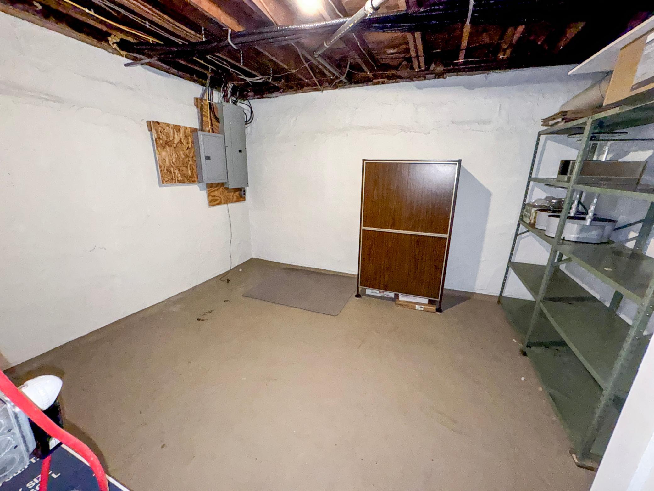 Lower level storage room/workout room/ fruit cellar