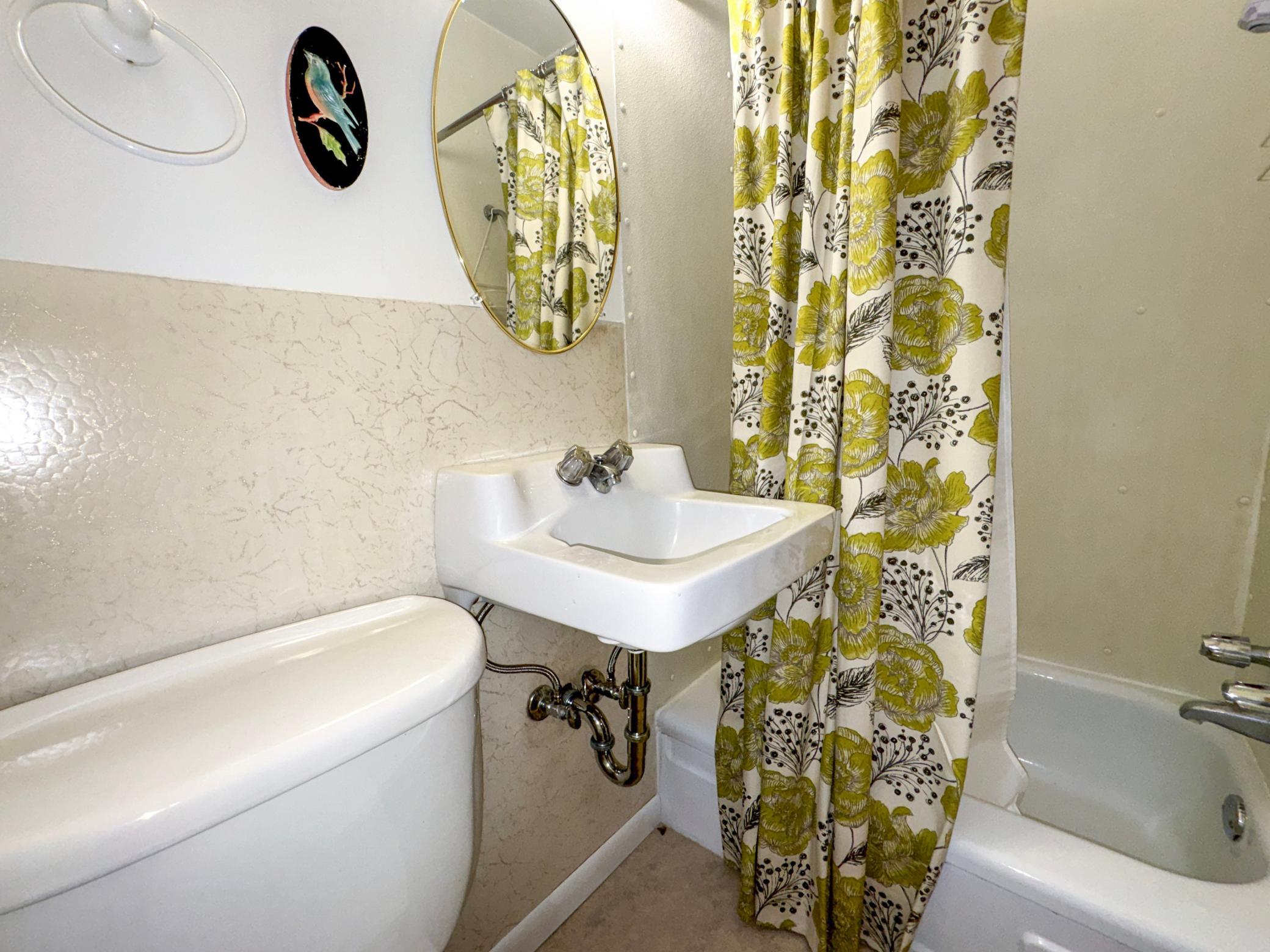 Spacious upstairs bedroom with private full bathroom.