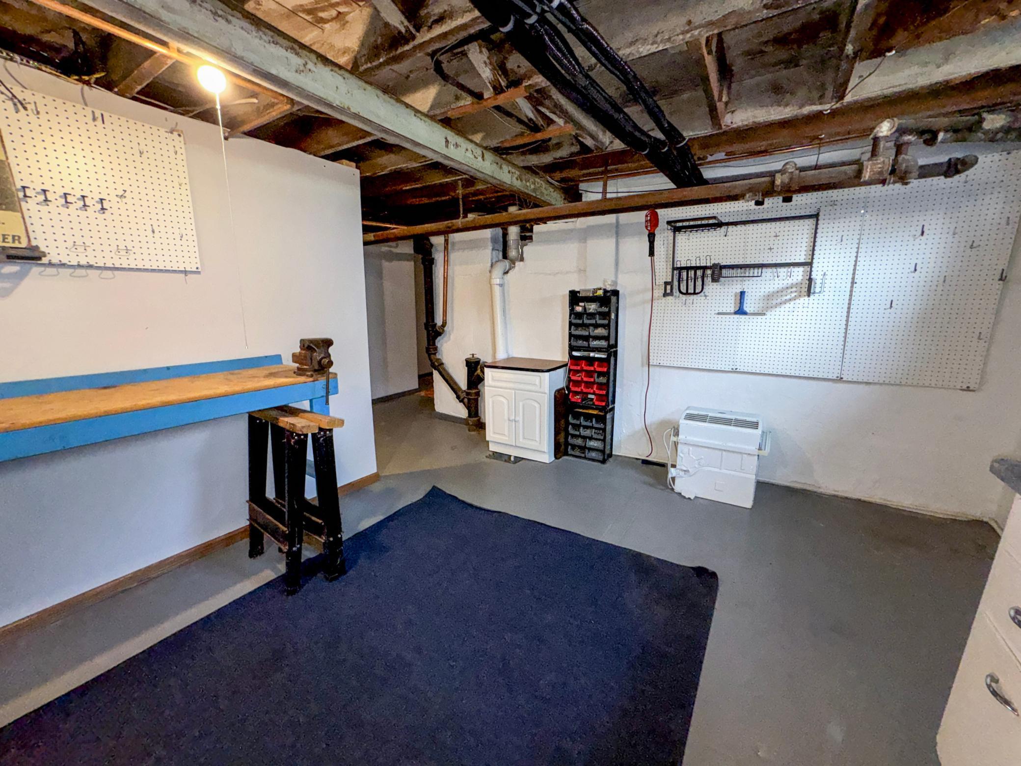 Lower level workshop or storage room