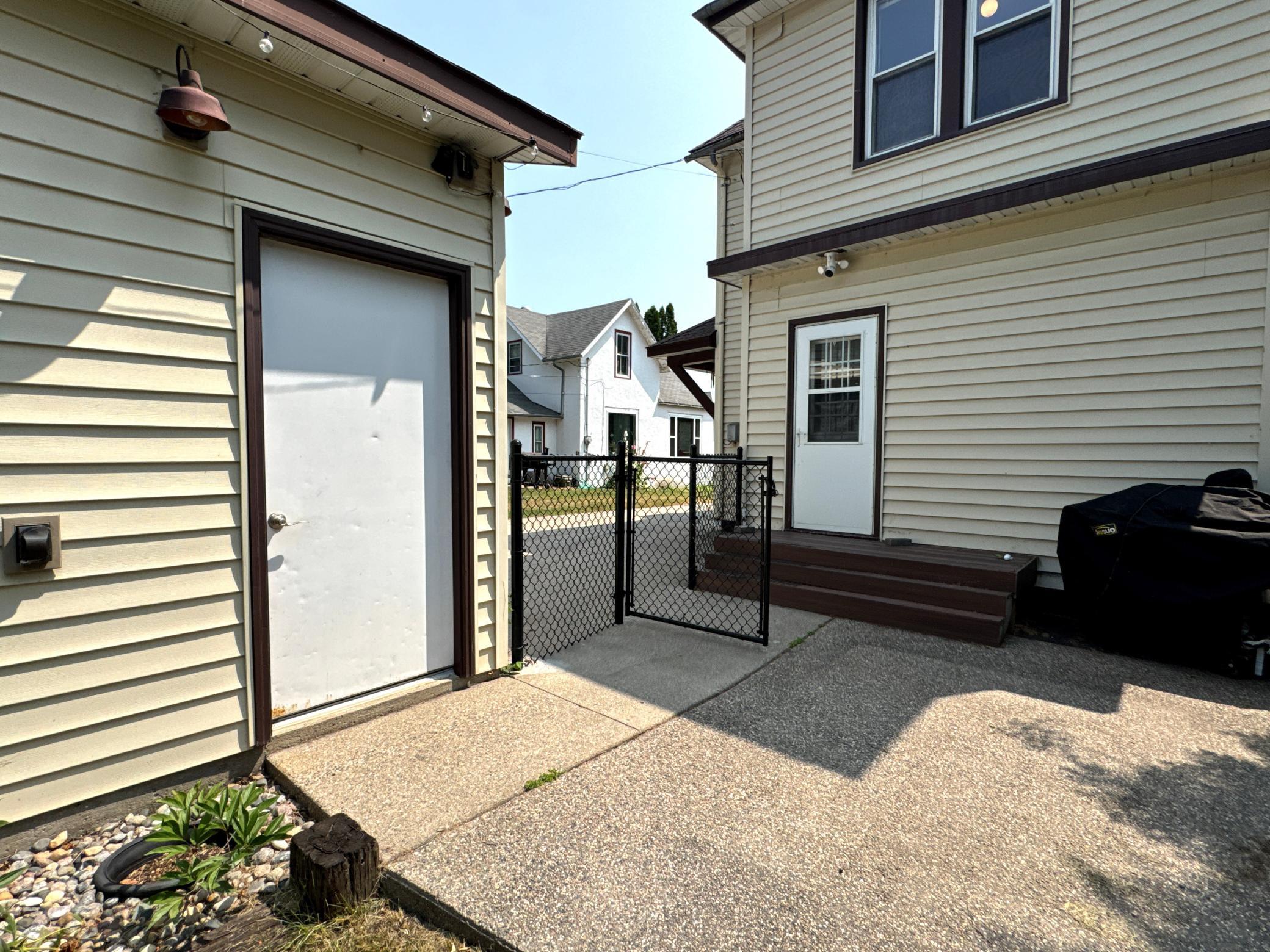 Enjoy quiet evenings on the backyard patio overlooking the fenced yard. Garage is located just a few steps from the back door