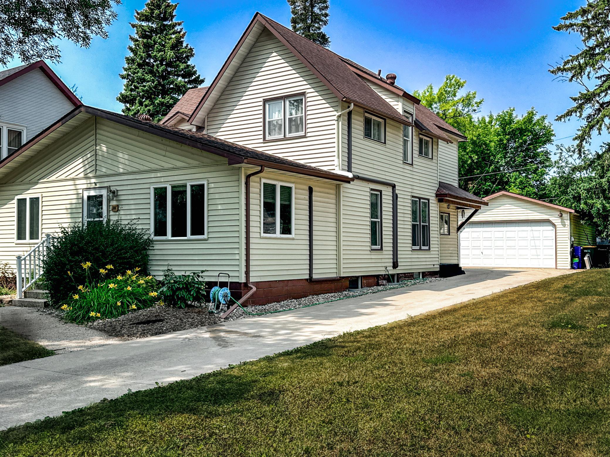 Heated and insulated two-stall detached garage with plenty of room for vehicles and hobbies.