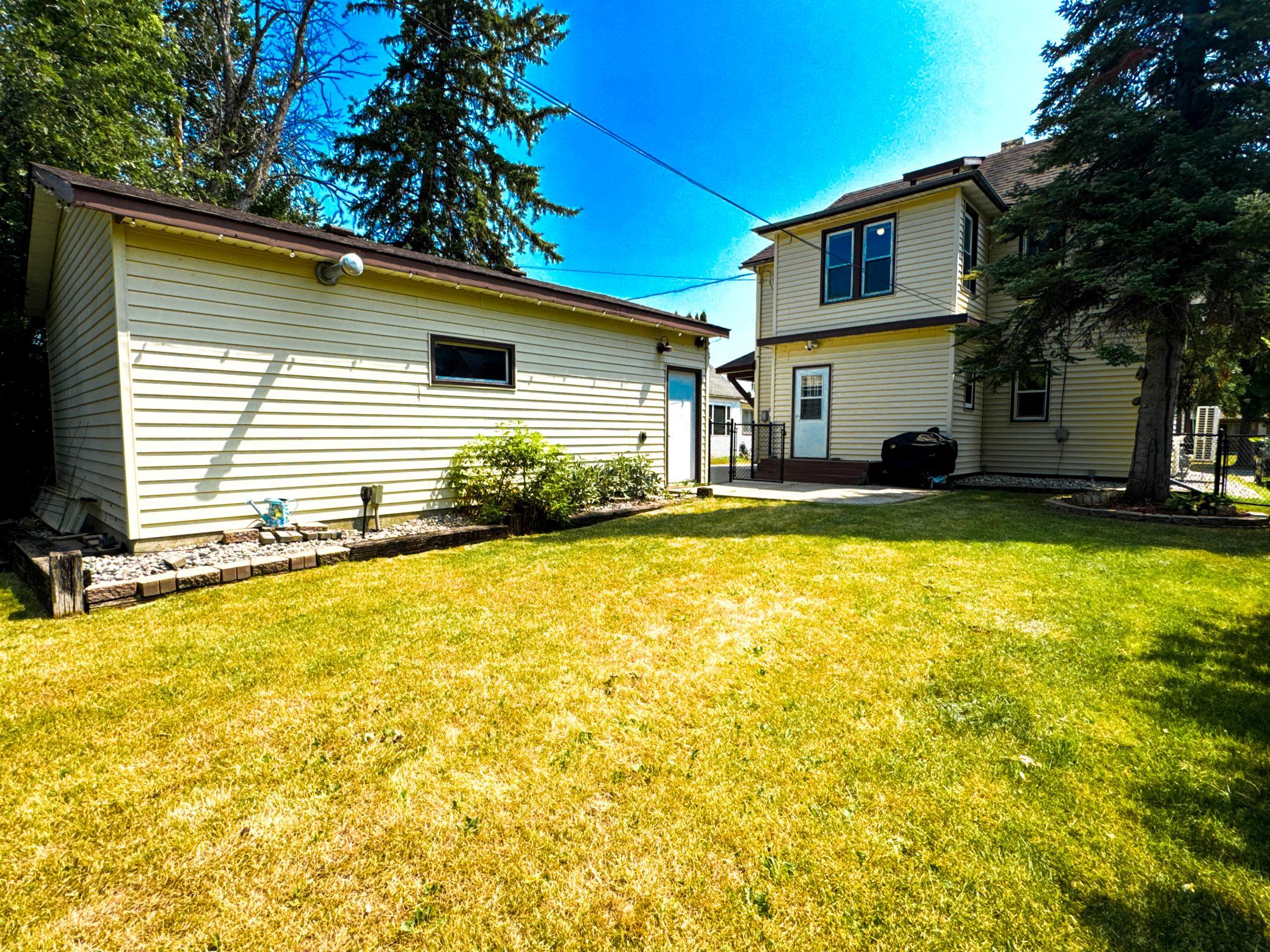 Enjoy quiet evenings on the backyard patio overlooking the fenced yard.