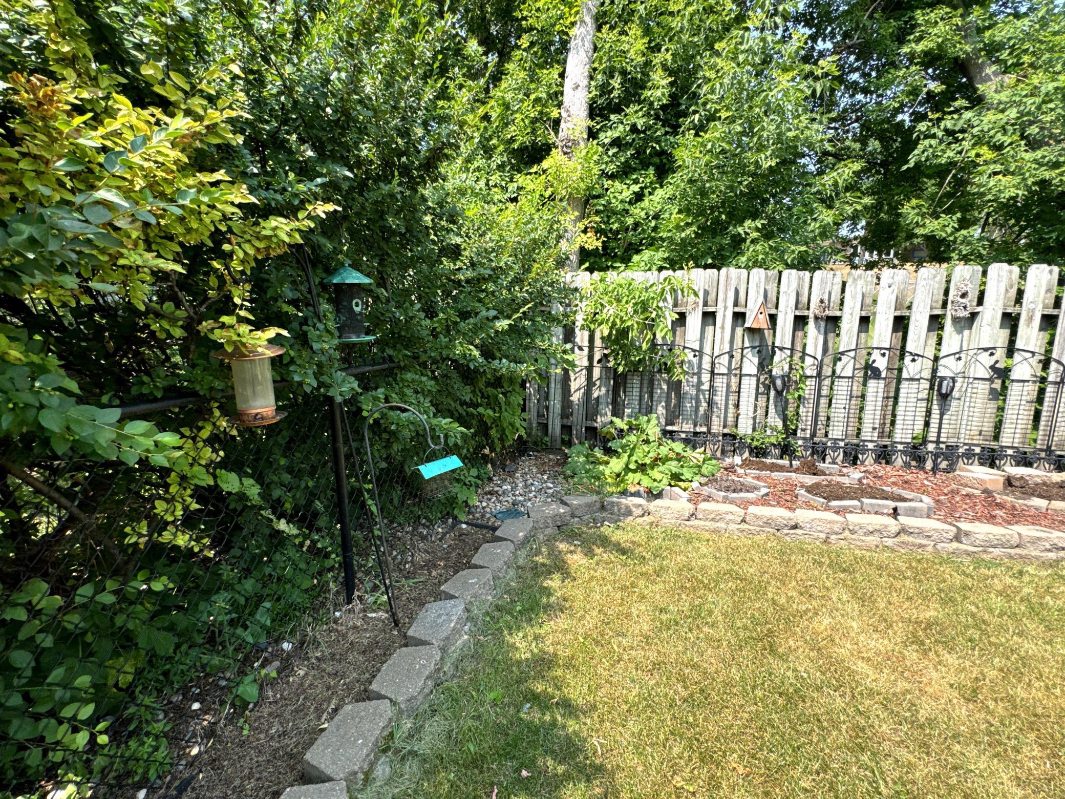 Enjoy quiet evenings on the backyard patio overlooking the fenced yard.