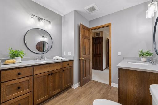 Updated vanities, two sinks and Quartz countertops.