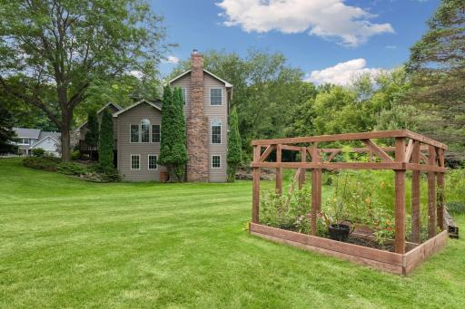 This garden enclosure and nearby playset will remain the property.