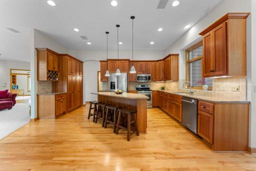 Natural cherry cabinets and hardwood floors.
