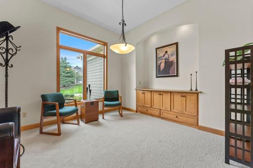 Formal dining room or parlor with built in buffet for extra storage.