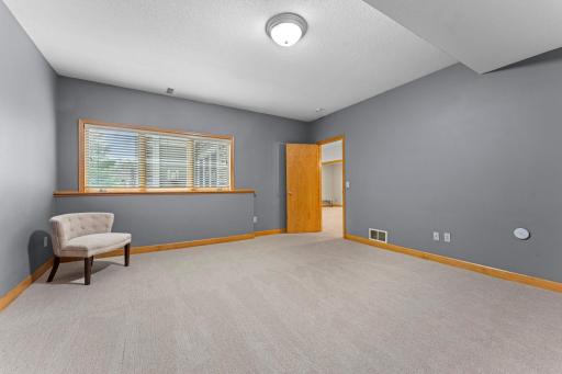 The spacious 2nd bedroom is very private and adjacent to a full bathroom.